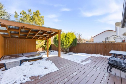 84 Mt Apex Green Se, Calgary, AB - Outdoor With Deck Patio Veranda