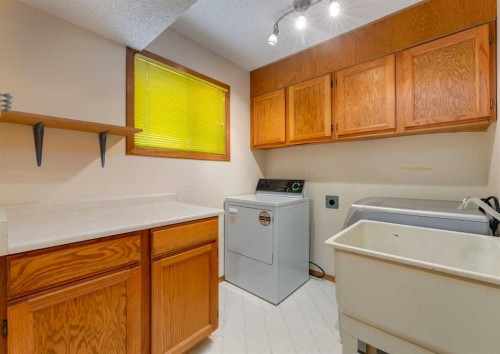 60 Macewan Glen Drive Nw, Calgary, AB - Indoor Photo Showing Laundry Room