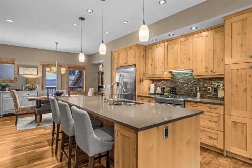 22 Streamside Lane, Canmore, AB - Indoor Photo Showing Kitchen With Double Sink With Upgraded Kitchen