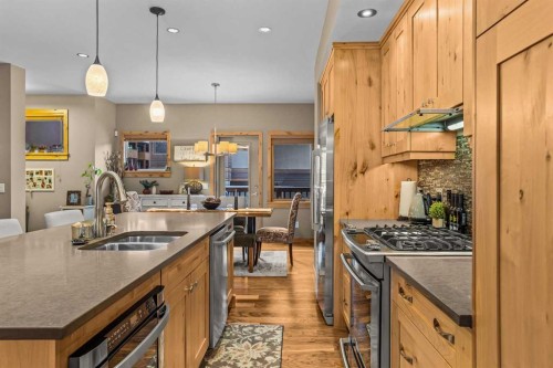 22 Streamside Lane, Canmore, AB - Indoor Photo Showing Kitchen With Double Sink
