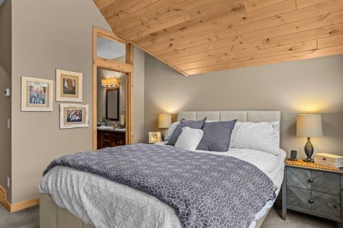 22 Streamside Lane, Canmore, AB - Indoor Photo Showing Bedroom