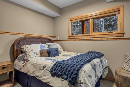 22 Streamside Lane, Canmore, AB - Indoor Photo Showing Bedroom
