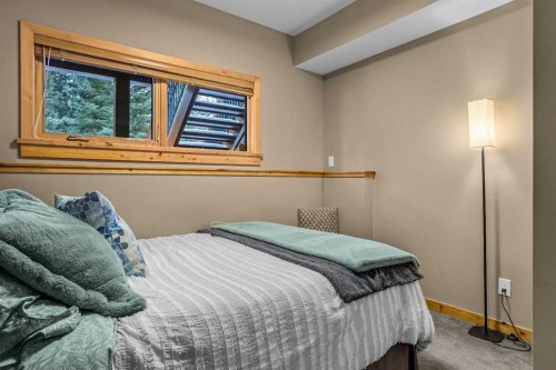 22 Streamside Lane, Canmore, AB - Indoor Photo Showing Bedroom