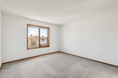 135 Sceptre Close Nw, Calgary, AB - Indoor Photo Showing Other Room