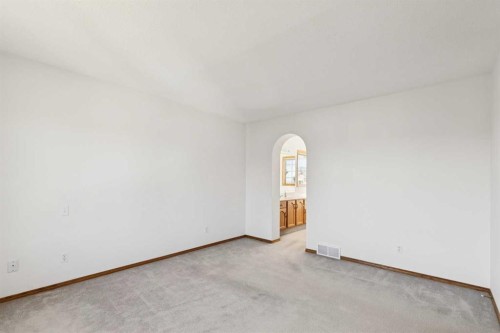 135 Sceptre Close Nw, Calgary, AB - Indoor Photo Showing Other Room