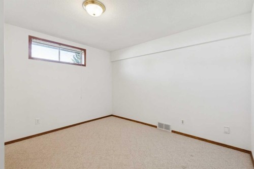 135 Sceptre Close Nw, Calgary, AB - Indoor Photo Showing Other Room