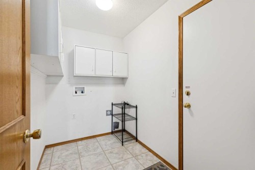 135 Sceptre Close Nw, Calgary, AB - Indoor Photo Showing Other Room