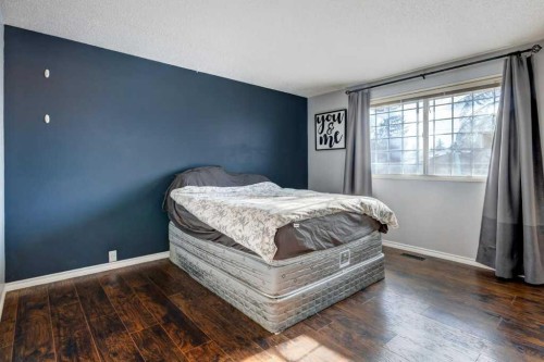 35 Penworth Place Se, Calgary, AB - Indoor Photo Showing Bedroom