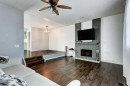 35 Penworth Place Se, Calgary, AB  - Indoor Photo Showing Living Room With Fireplace 