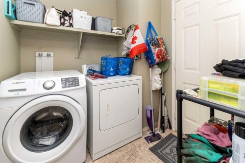 63 Hawkmount Green Nw, Calgary, AB - Indoor Photo Showing Laundry Room