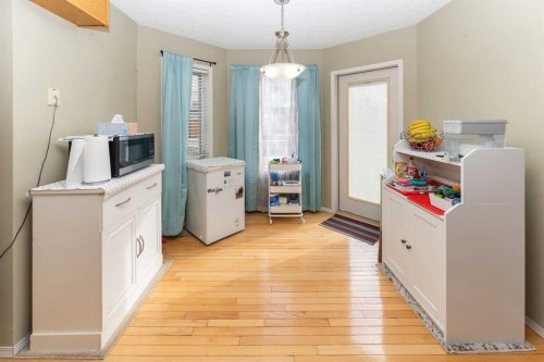 63 Hawkmount Green Nw, Calgary, AB - Indoor Photo Showing Laundry Room