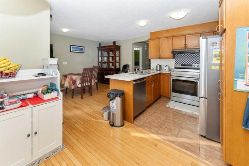 63 Hawkmount Green Nw, Calgary, AB - Indoor Photo Showing Kitchen With Double Sink