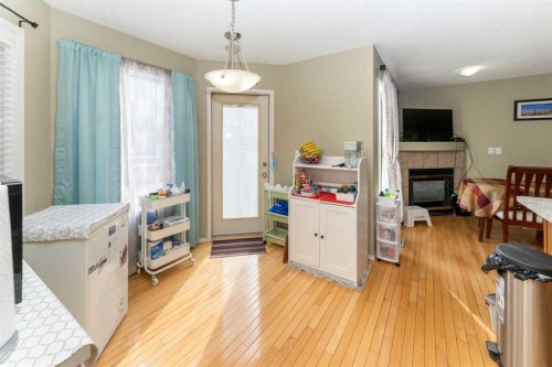 63 Hawkmount Green Nw, Calgary, AB - Indoor With Fireplace