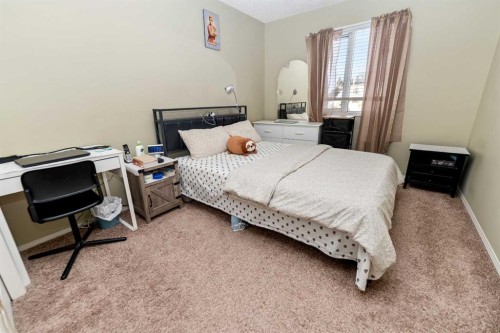 63 Hawkmount Green Nw, Calgary, AB - Indoor Photo Showing Bedroom
