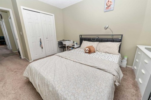 63 Hawkmount Green Nw, Calgary, AB - Indoor Photo Showing Bedroom
