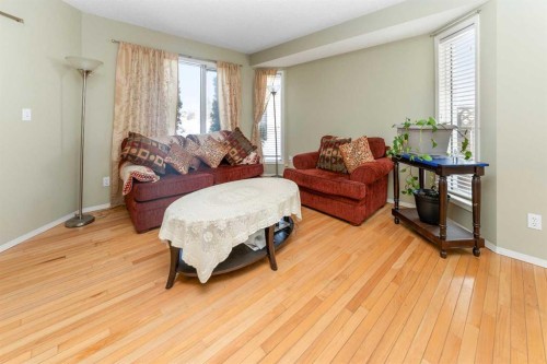 63 Hawkmount Green Nw, Calgary, AB - Indoor Photo Showing Living Room