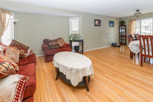 63 Hawkmount Green Nw, Calgary, AB - Indoor Photo Showing Living Room