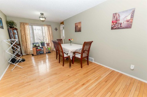 63 Hawkmount Green Nw, Calgary, AB - Indoor Photo Showing Dining Room