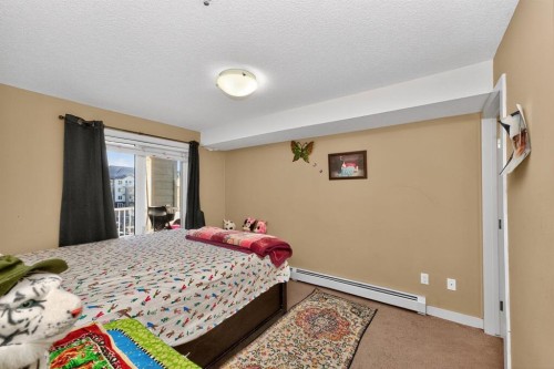 1303-6118 80 Avenue Ne, Calgary, AB - Indoor Photo Showing Bedroom