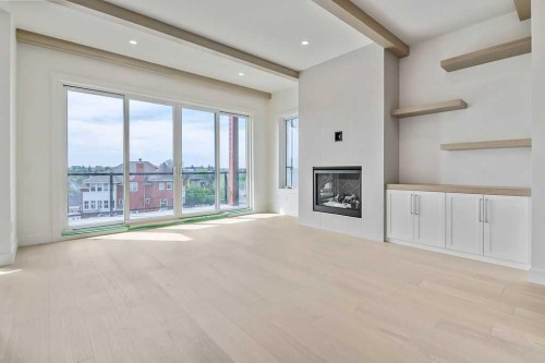 712 Bridge Crescent Ne, Calgary, AB - Indoor With Fireplace