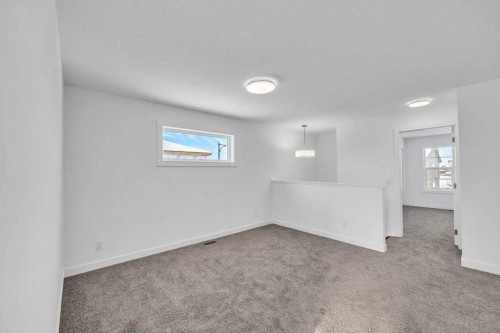 1115 Chinook Winds Circle Sw, Airdrie, AB - Indoor Photo Showing Other Room