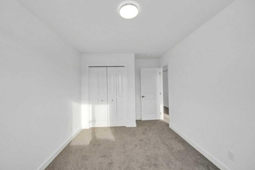 1115 Chinook Winds Circle Sw, Airdrie, AB - Indoor Photo Showing Other Room