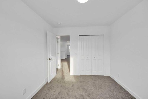 1115 Chinook Winds Circle Sw, Airdrie, AB - Indoor Photo Showing Other Room