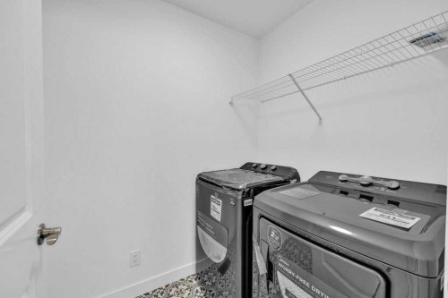1115 Chinook Winds Circle Sw, Airdrie, AB - Indoor Photo Showing Laundry Room