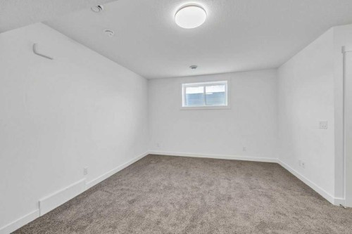 1115 Chinook Winds Circle Sw, Airdrie, AB - Indoor Photo Showing Other Room