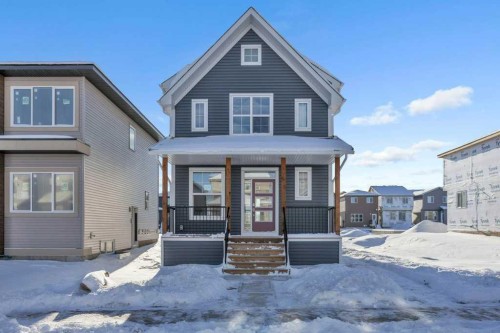 1115 Chinook Winds Circle Sw, Airdrie, AB - Outdoor With Deck Patio Veranda With Facade