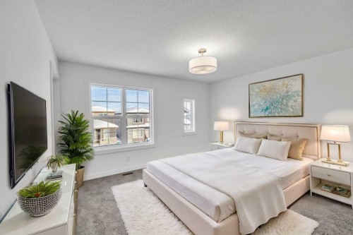 1115 Chinook Winds Circle Sw, Airdrie, AB - Indoor Photo Showing Bedroom