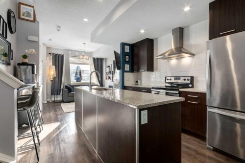 415 Saddlemont Boulevard Ne, Calgary, AB - Indoor Photo Showing Kitchen With Upgraded Kitchen