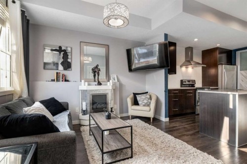 415 Saddlemont Boulevard Ne, Calgary, AB - Indoor With Fireplace