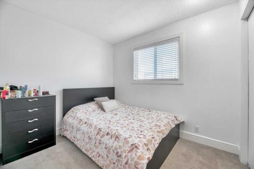 19 Castlepark Way Ne, Calgary, AB - Indoor Photo Showing Bedroom