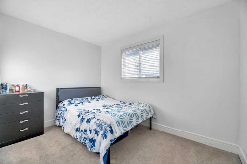 19 Castlepark Way Ne, Calgary, AB - Indoor Photo Showing Bedroom