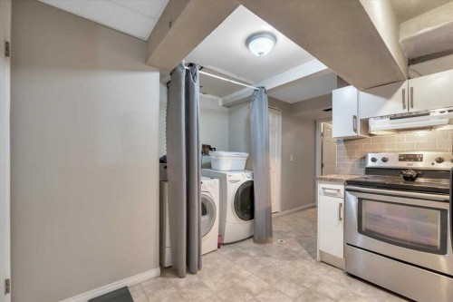 19 Castlepark Way Ne, Calgary, AB - Indoor Photo Showing Laundry Room
