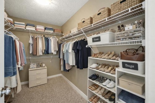 124 Kingsbridge Way Se, Airdrie, AB - Indoor With Storage