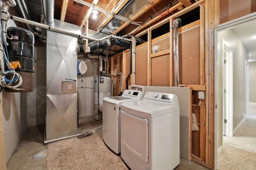 124 Kingsbridge Way Se, Airdrie, AB - Indoor Photo Showing Laundry Room