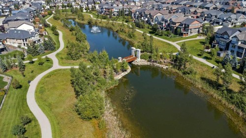 124 Kingsbridge Way Se, Airdrie, AB - Outdoor With Body Of Water With View