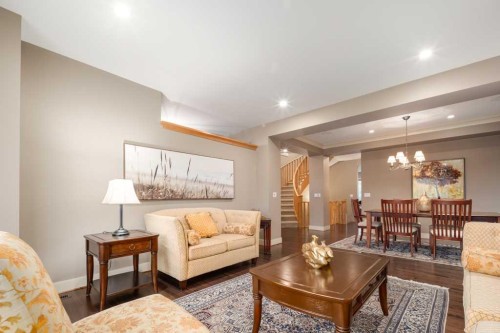 24 Aspen Meadows Green Sw, Calgary, AB - Indoor Photo Showing Living Room