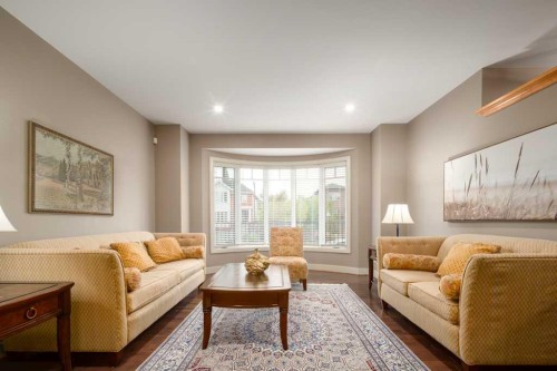24 Aspen Meadows Green Sw, Calgary, AB - Indoor Photo Showing Living Room