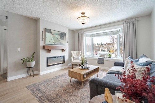 531 Deerpath Court Se, Calgary, AB - Indoor Photo Showing Living Room With Fireplace