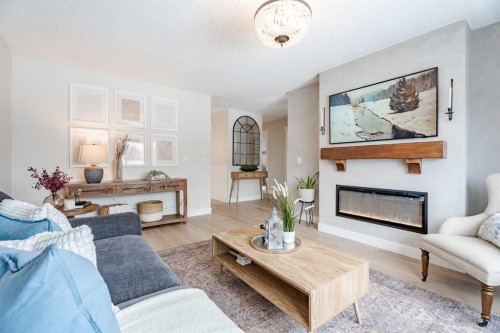 531 Deerpath Court Se, Calgary, AB - Indoor Photo Showing Living Room With Fireplace