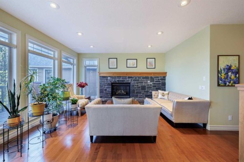 118 Tusslewood Heights Nw, Calgary, AB - Indoor Photo Showing Living Room With Fireplace