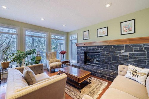 118 Tusslewood Heights Nw, Calgary, AB - Indoor Photo Showing Living Room With Fireplace
