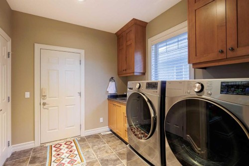 118 Tusslewood Heights Nw, Calgary, AB - Indoor Photo Showing Laundry Room