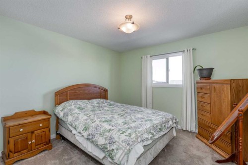 158 Fireside Bend, Cochrane, AB - Indoor Photo Showing Bedroom