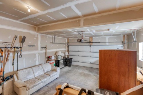 158 Fireside Bend, Cochrane, AB - Indoor Photo Showing Garage