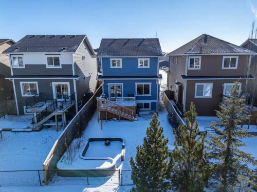 158 Fireside Bend, Cochrane, AB - Outdoor With Deck Patio Veranda With Facade