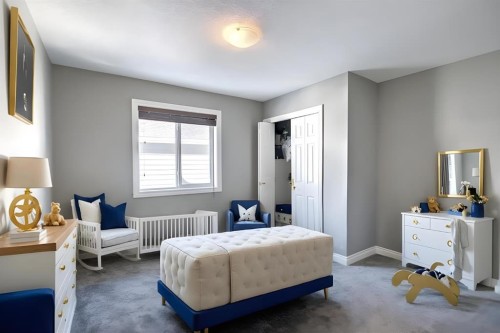 22 Evansborough View Nw, Calgary, AB - Indoor Photo Showing Bedroom